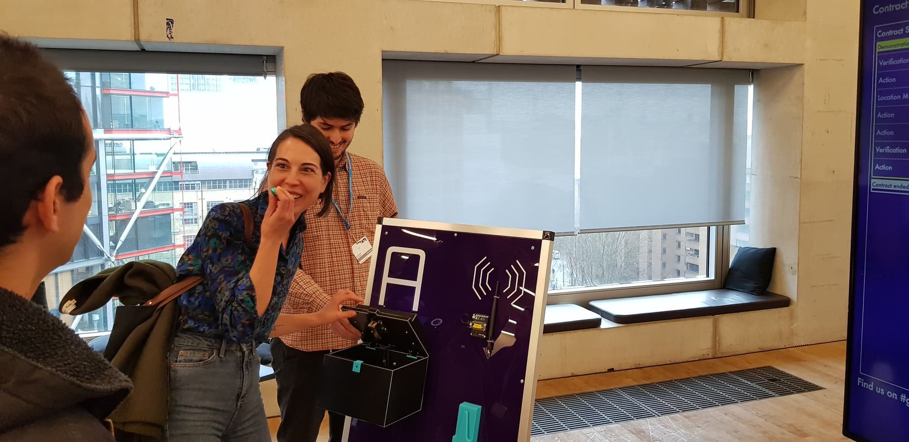A couple play with an early version of GeoPact at the Tate Exchage event
'Living with the Internet of Things'.